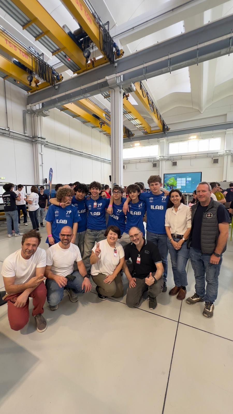 Tachyons team and mentors in the competition hall